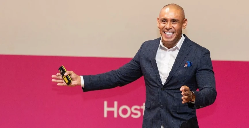 Jonathan Sabarre speaking on stage